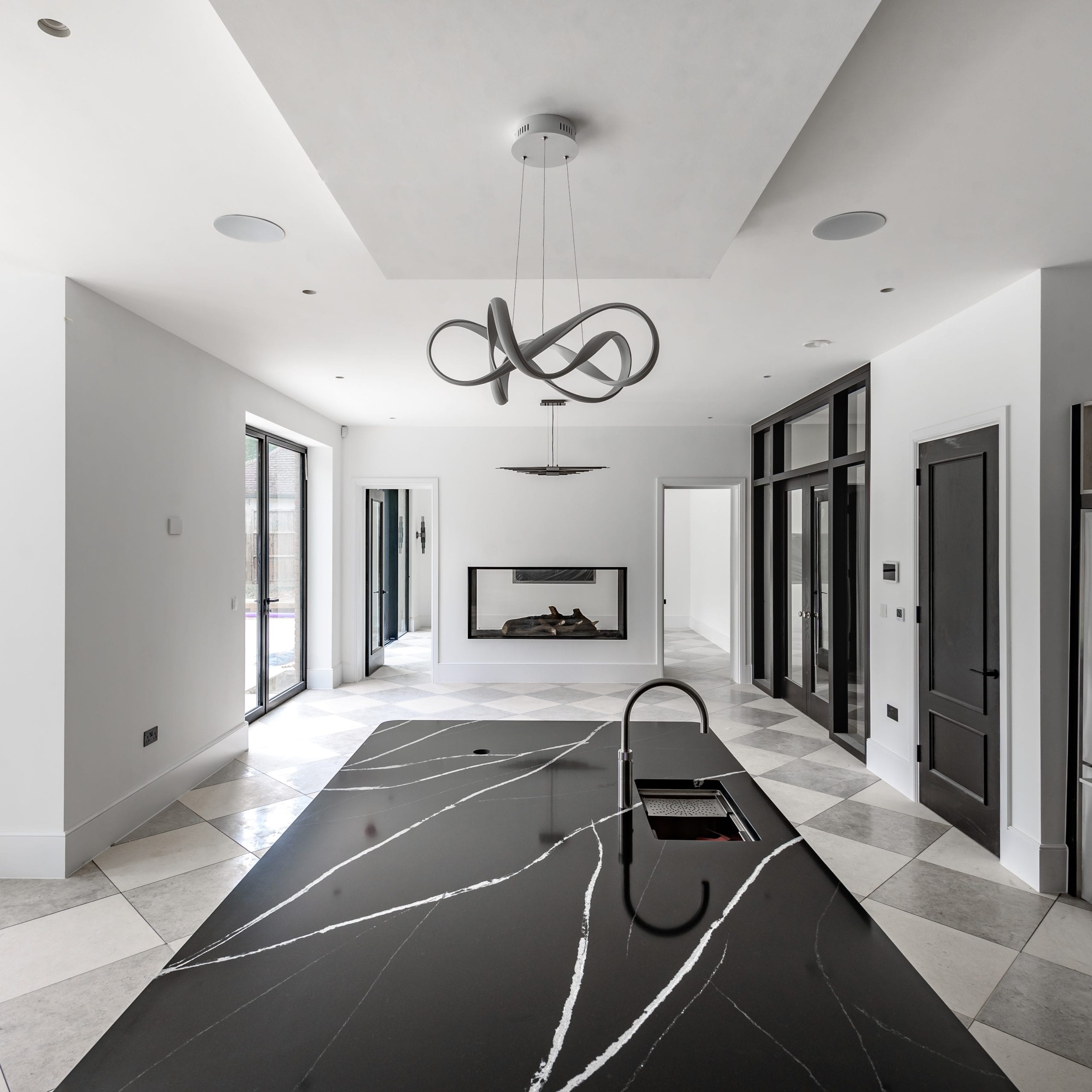 Light detail within a fully plastered media wall by KCL Interiors